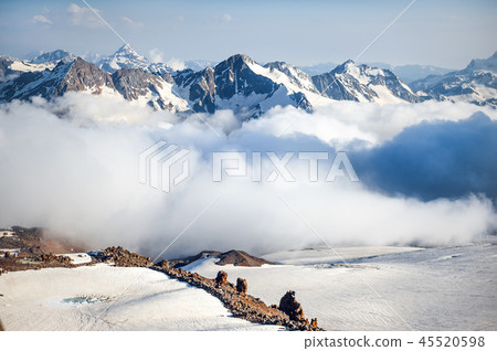 Clubs of fog and clouds move along 45520598