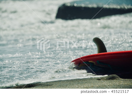 Surfboard on the beach 45521517