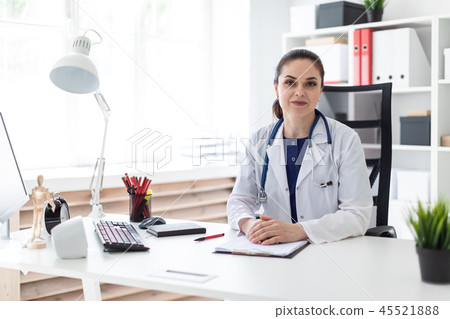 Portrait of a young girl in a white robe Portrait of a young girl in a white robe 45521888