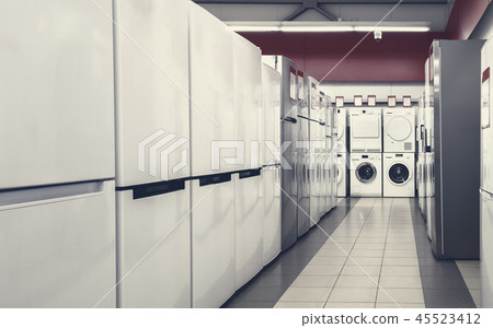 refrigerators and washing mashines in appliance store 45523412