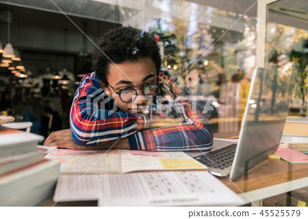 Sad unhappy student thinking about the exam Sad unhappy student thinking about the exam 45525579