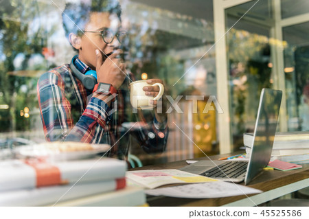 Nice good looking man drinking delicious coffee 45525586