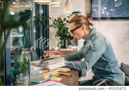 Intelligent serious man working on the laptop 45525673
