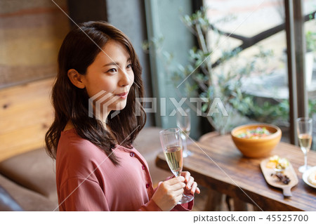 Cafe champagne female portrait image 45525700