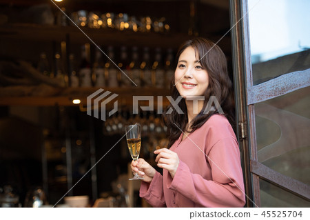 Cafe champagne female portrait image 45525704
