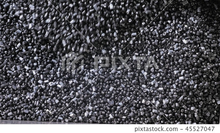 Plastic black gray granulated crumb. Manufacture of plastic water pipes factory. Process of making Plastic black gray granulated crumb. Manufacture of plastic water pipes factory. Process of making 45527047
