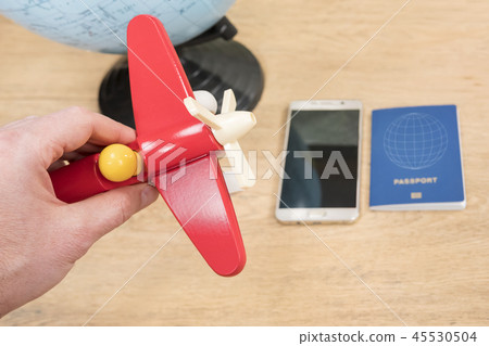 man hand with a plane 45530504