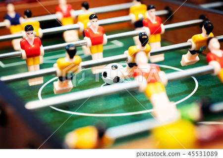 Foosball table soccer. Sport player concept 45531089