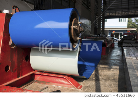 Coiled steel in metal sheet rolling machine Coiled steel in metal sheet rolling machine 45531660