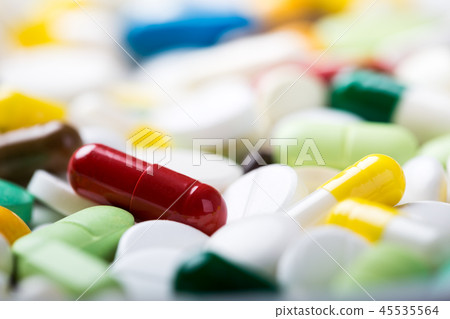 A lot of different medicine pills and capsules A lot of different medicine pills and capsules 45535564