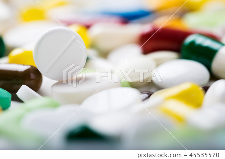 A lot of different medicine pills and capsules A lot of different medicine pills and capsules 45535570