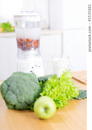 Preparing detox smoothie in blender 45535881