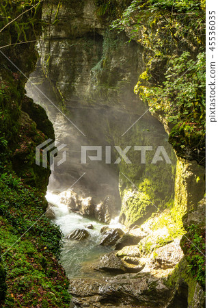 Amazing view on waterfall in the picturesque Martvili canyon in Georgia near Kutaisi. Beautiful Amazing view on waterfall in the picturesque Martvili canyon in Georgia near Kutaisi. Beautiful 45536035