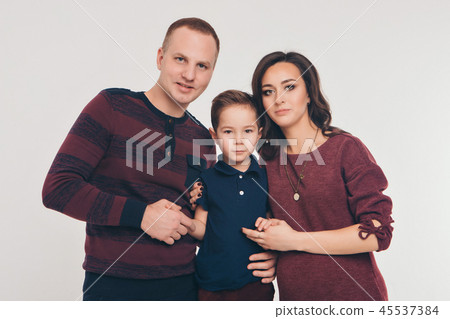 baby on hands of parents on a white background baby on hands of parents on a white background 45537384