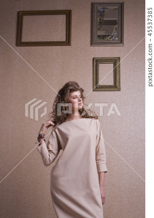 beautiful long-haired girl in long dress beautiful long-haired girl in long dress 45537385