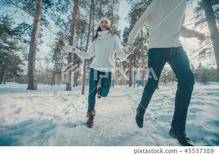 Couple in love in the winter forest Couple in love in the winter forest 45537389