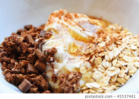 Healthy food - breakfast in a white dish. Muesli. 45537481