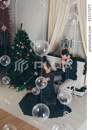a man and a woman in a long dress a man and a woman in a long dress 45537977