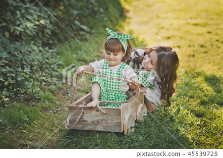 The sisters ride the berry cart 1881. 45539728
