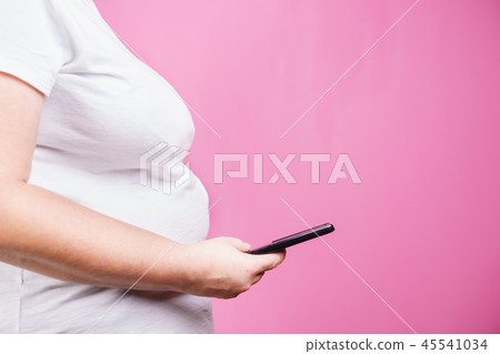 lack physical activity, fat woman with smartphone 45541034