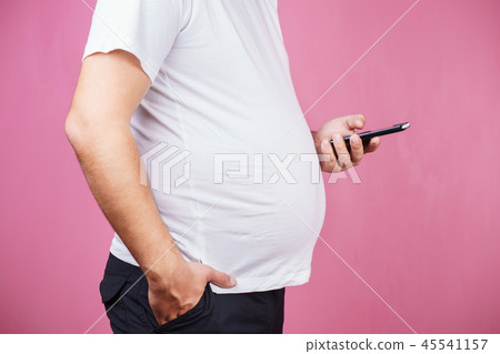 lack of physical activity, fat man with smartphone 45541157
