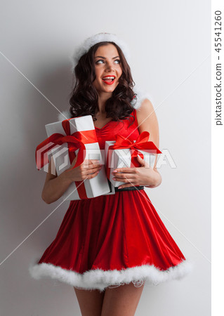 Woman with Christmas presents 45541260