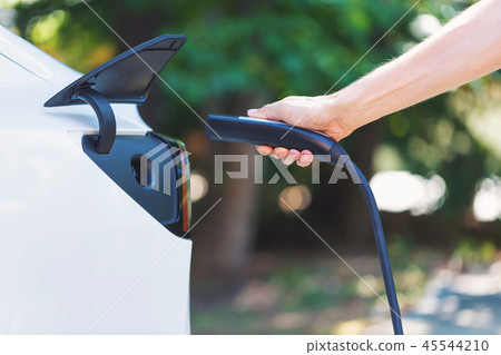 Charging an electric vehicle Charging an electric vehicle 45544210
