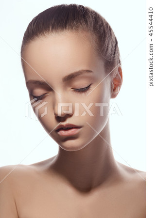 Front portrait of beautiful face with beautiful closed eyes - isolated on white 45544410