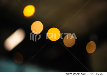 Blurry background of city light in the nightlife 45545366