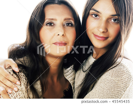 cute pretty teen daughter with real mature mother hugging, fashi cute pretty teen daughter with real mature mother hugging, fashi 45545435