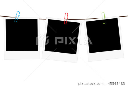 Three blank polaroid frames hanging on a rope 45545483