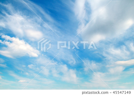 Light cumulus clouds in the blue sky. 45547149