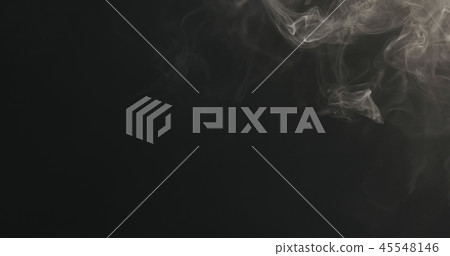 closeup vapor floating in air on black background 45548146