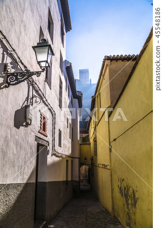 Narrow street in historical city of Granada, Spain Narrow street in historical city of Granada, Spain 45548186