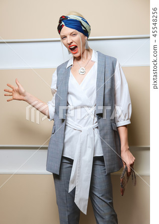 Screaming lady. Portrait of a girl shouting loud. 45548256