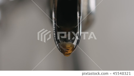 closeup shot of espresso machine brewing coffee closeup shot of espresso machine brewing coffee 45548321