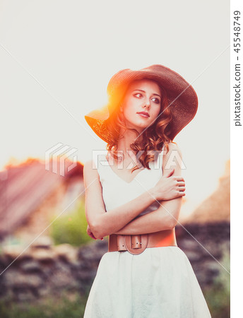 girl in white dress at countryside. girl in white dress at countryside. 45548749