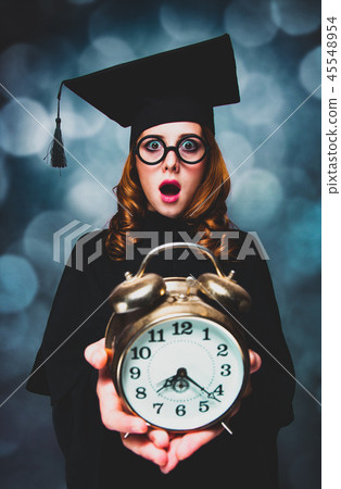 student girl holding alarm clock student girl holding alarm clock 45548954