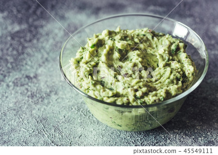 Guacamole in the glass bowl 45549111