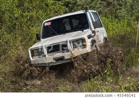 Off road car overcomes the track Off road car overcomes the track 45549141