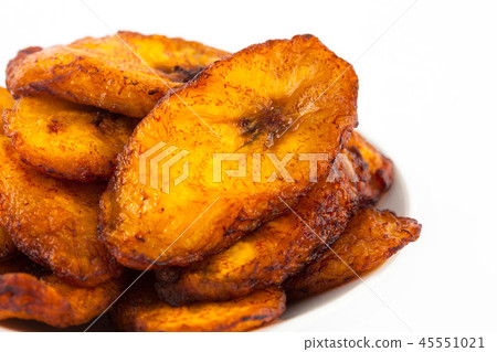 Deep fried ripe plantain slices isolated 45551021
