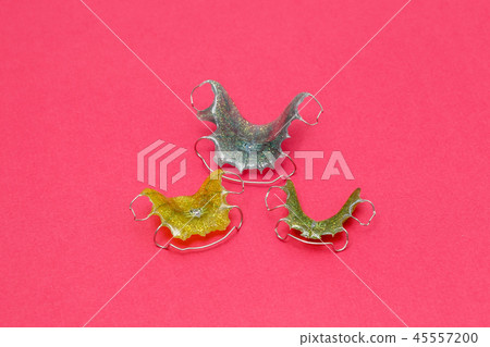 Colorful dental braces or retainers for teeth 45557200