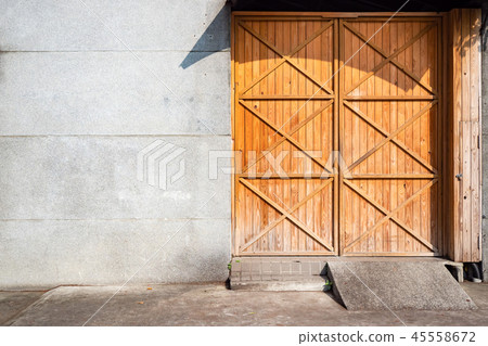 Old wooden doors. Warehouse entrance. Old wooden doors. Warehouse entrance. 45558672