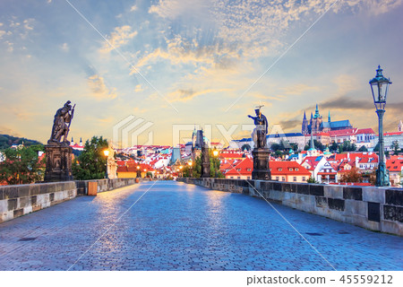 Charles Bridge statues and view on Prague Castle at sunrise 45559212