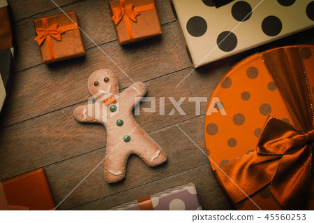 Cookie man and christmas gifts around Cookie man and christmas gifts around 45560253