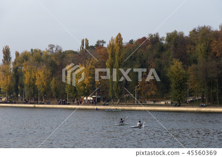 A wonderful weekend in a city park with a lake. A wonderful weekend in a city park with a lake. 45560369