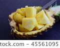 Pineapple cubes in its own pineapple bowl 45561095
