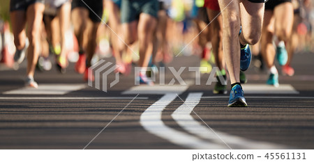 Marathon running race, large group of runners 45561131