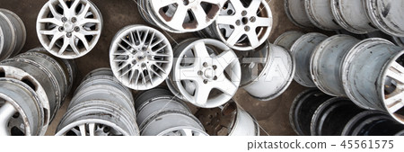 Auto parts market. Car wheels are on the ground. 45561575