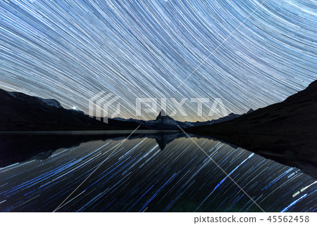 Incredible night view of Stellisee lake with Matterhorn peak in Swiss Alps 45562458